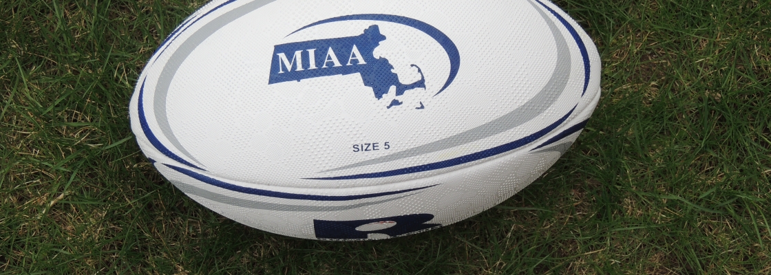 an MIAA logo on a rugby ball