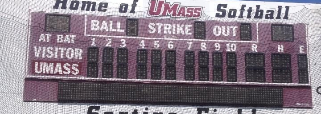 a softball field score sign
